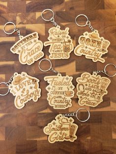 Show off your Country spirit with one of these laser engraved, wooden keychains. Need a cute gift for the cowgirl in your life, look no further than one of our keychains. Pick the saying that fits her personality! Choose from 7 Different Sayings Below: "Southern by the Grace of God" "Raised on Sweet Tea and Jesus" "Gone Country" "I love Cowboys" "Fueled by Coffee and Country Music" "Boots, Lace and a whole lot of Grace" "Southern Girl" I Love Cowboys, Xtool Projects, By The Grace Of God, Country Line, Engraving Ideas, Creative Creations, Her Personality, The Grace Of God, Grace Of God