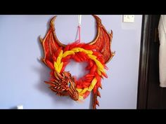 there is a dragon decoration hanging on the wall