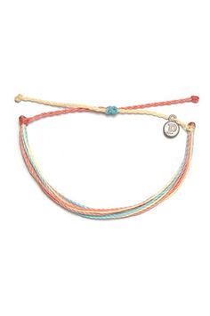 Every bracelet is 100% waterproof. Go surf, snowboard, or even take a shower with them on. Wearing your bracelets every day only enhances the natural look and feel. Every bracelet is unique and hand-made therefore a slight variation in color combination may occur. - 100% waterproof- wax-coated- iron-coated copper "P" charm- adjustable from 2-5 inches in diameter- Final Sale - no returns or exchanges P Bracelets, Puts Vida Bracelets, Pura Vida Bracelets Aesthetic, Obx Wardrobe, Pure Vida Bracelets, Puravida Bracelets, Brand Bracelet, Pura Vida Jewelry, Beach Bracelet