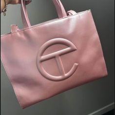 Medium Pink Telfar Tote Bag ! It’s Very Nice And Oversized . Only Worn A Handful Of Times It’s Like New And Comes With Original Telfar Bag Packaging Telfar Tote Bag, Pink Telfar, Medium Telfar, Telfar Bags, Telfar Bag, Bag Packaging, Womens Tote Bags, Like New, Packaging