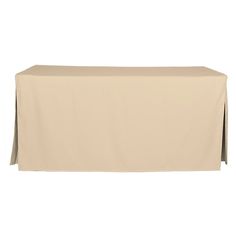 a table covered with a beige cloth