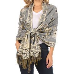 This pashmina shawl features a unique gorgeous patterned design. The designs are multi colored. The color combination for each scarf is gorgeous with the most beautiful hues. The tassels are a blend of two different colors of fabric woven together. This scarf is long and wide, opaque, and mid weight. To style this scarf, wear with your favorite pair of jeans, skirt or dress. Can be styled with fringe accessories, and colorful jewelry. This scarf is great for both cooler and warmer weather! For c Whimsigoth Style, Fringe Accessories, Trim Scarf, Dubai Vacation, Jeans Skirt, Weather Wear, Summer Scarves, Pashmina Shawl, Fashion Inspiration Design