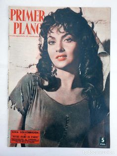 an old magazine cover with a woman's face