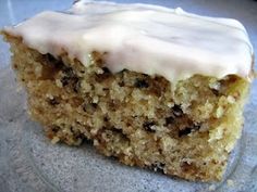 a close up of a piece of cake with frosting on it's surface