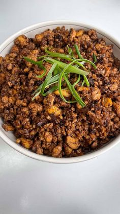 Minced Tofu with Spicy Black Bean Sauce uses extra firm tofu crumbled and cook to resemble a minced meat texture. Easy chinese vegan recipe.