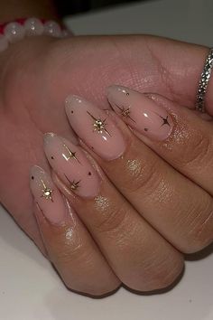 Dominican Nail Styles: Best 2024 Summer Picks Almond Nails With Sparkle Design, Chrome Nails Designs Stars, Gold Star Almond Nails, Clear Nails With Gold Stars, Prom Nails Inspo Almond, Almond Nails Gold Stars, Almond Shaped Star Nails, Hold Accent Nails, Pink Star Almond Nails