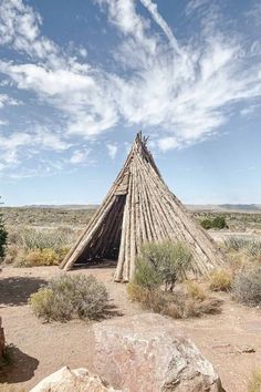 an old teepee hut in the middle of nowhere