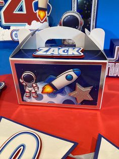 a box with an image of a space shuttle on it sitting on top of a table