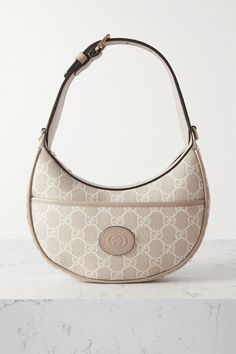 The crescent moon shape of Gucci's mini bag emulates the label's vintage designs. Made in Italy from the house's signature 'GG Supreme' coated-canvas and trimmed with leather, it has all the hallmarks of a brand classic. Gucci Mini Bag, Gucci Mini, Fancy Bags, Designer Shoulder Bags, Boot Bag, Mini Purse