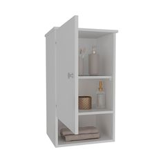 a white bathroom cabinet with towels and soap dispensers on it's shelves