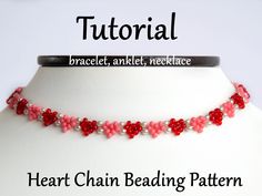 a red beaded necklace on a white mannequin with the words heart chain beading pattern