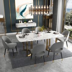 an elegant dining room with marble table and grey chairs, gold trim around the legs