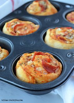 mini pizzas in a muffin tin ready to be eaten