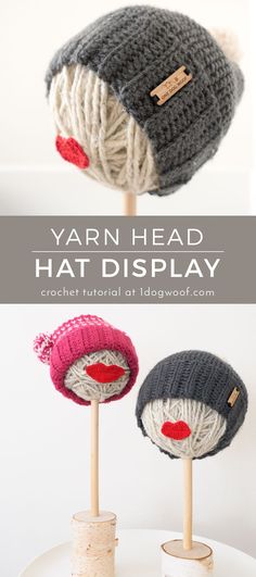 two knitted hats sitting on top of each other with the words yarn head hat display