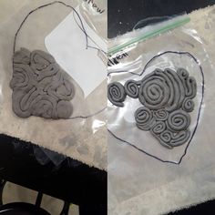 two images one is made out of clay and the other shows an image of a heart with spirals on it