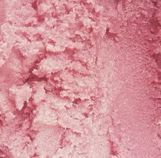 a close up view of some pink colored food