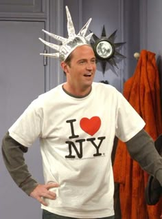 a man wearing a t - shirt with the words i love new york on it