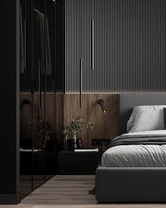 a bed sitting in the middle of a bedroom next to a wall with vertical blinds