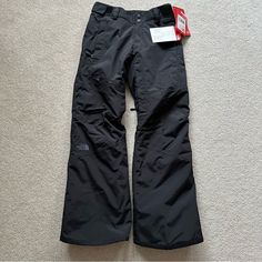 The North Face Thermoball Snow Pants Women's, Black, Size Xs Short The North Face Thermoball Snow Pants Women's Features: Waterproof Ski Pants Insulated With Warm Thermoball Powered By Primaloft From The Mid-Thigh Down Thermoball Insulation Retains Warmth In Wet, Cold Conditions Relaxed Fit Waterproof, Breathable, Fully Seam Sealed Adjustable Waist Tabs Zip Hand Pockets Polyurethane (Pu) Thigh Pocket Inner-Thigh Vents Stretchvent Gaiter With Gripper Elastic Chimney Venting System Improves Airflo Winter Pants Women Cold Weather, Snow Pants Women's, North Face Pants, Winter Pants, Inner Thigh, Ski Pants, Black North Face, Snow Pants, Christmas Wishlist