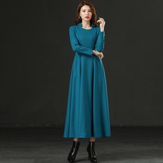 FEATURES Wool blend 25% wool, other fiber,nylon Polyester lining Back zipper closure Long sleeve Fit and flare Regular fit Mid calf Perfect for winter, autumn More color SIZE Available in sizes XS-XL How to choose size ? 1.Check your body measurement with instructions https://www.etsy.com/listing/794054080 2.Get your size in Size Chart with your body measurement https://www.etsy.com/listing/794055682 3.Send me your measurement if you need help Bust Waist Hips Your over all Height Weight Bra size Long Blue Winter Dress, Winter A-line Maxi Dress, Wool Long Sleeve Midi Dress For Fall, Wool Midi Dress With Long Sleeves For Fall, Fall Long Sleeve Wool Midi Dress, Fall Wool Midi Dress With Long Sleeves, Wool Long Sleeve Midi Dress For Spring, Solid Color A-line Long Sleeve Winter Dress, Winter A-line Long Sleeve Dress