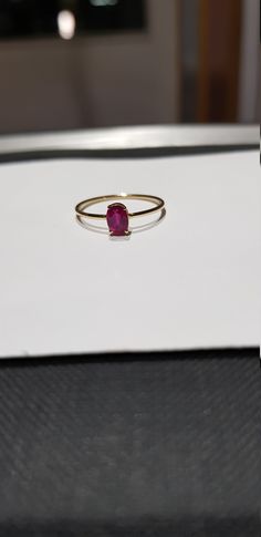 14k solid yellow gold 6x4 mm natural ruby precious gemstone ring. 1. The weight of the natural ruby precious gemstone used in the ring =0.56 cts. 2. The weight of the 14k solid yellow gold used in the ring=0.840 gms. The ruby is the birthstone for the people born in the month of July. This is absolutely gorgeous ring. I am pretty confident that my work will be appreciated. Thanks. Dainty Oval Red Ruby Ring, Oval Ruby Ring In 14k Gold As Gift, Oval Ruby Birthstone Ring With Prong Setting, Fine Jewelry Oval Solitaire Ruby Ring, Oval Ruby Rings In Yellow Gold, Oval Ruby Ring In 14k Gold, Oval Ruby Ring Fine Jewelry, Oval Red Birthstone Ring In 14k Gold, Fine Jewelry Yellow Gold Ruby Ring Oval Cabochon