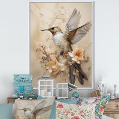 a bird sitting on top of a bed next to pillows and pillow cases in front of a painting