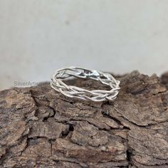 Minimalist braid ring, Braid ring, Twist ring, twist band, Rope ring, Rope Band, Boho Ring, silver stack ring, 925 silver ring, dainty ring  HANDMADE ITEMS * Metal: 925 Sterling Silver * Country of origin: India * Category: Rings * Assay: 925 * Size: All USA Size  * 925 sterling silver (stamped) * FAST Free Shipping Our jewelry is handmade with care using high quality materials sourced locally and internationally. We ensure durability and lasting wear and stand behind the quality of our jewelry. Rope Ring, Rope Rings, Zierlicher Ring, Braided Ring, Stack Ring, Twisted Band, Twist Ring, 925 Silver Ring, Boho Ring