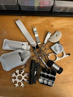 several kitchen utensils are arranged on a table