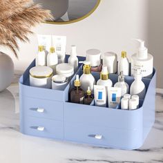 1 large drawer and 2 small drawers for your facial mask or vanity kit&small item. 8 top compartments hold at least 8-10 lotions, 6-8 moisturizer 15-20 makeup brushes of various sizes, 10-20 lipsticks, 8-10 nail polishes, 10 eyeliners, 3 large eye shadow palettes, and other small everyday collection. Let you quickly find what you need with the makeup organizer. Latitude Run® Finish: Blue | Latitude Run® Makeup Organizer for Large Capacity 5.98 H x 13.39 W x 8.66 D in Blue | 5.98" H X 13.39" W X 8 20 Makeup, Vanity Organization, Skincare Organization, Bathroom Countertops, Small Drawers, Makeup Organizer, Facial Mask, Desk Organizer, Large Drawers