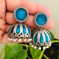 Blue Jhumka/ Blue Meenakari Jhumka/ Oxidized Silver Jhumka Earrings/ Blue Tribal Jhumka/ Designer Earrings/ Indian Ethnic Earrings Description: - Length: 2 Inches - Earring come with Push back Closure - Lightweight Meenakari Jhumka Earrings - Contemporary earrings in silver finish. - Very Elegant and stylish, these earrings can be paired with any traditional Indian or Western Attire depending upon the occasion and the theme. - The base is pure brass which makes this very sturdy and of good quali Cheap Handmade Women's Jhumkas, Blue Fusion Earrings With Latkans, Festive Blue Tilla Jhumkas, Blue Temple Jewelry Earrings For Gift, Blue Temple Jewelry Earrings With Latkans, Blue Temple Jewelry Jhumkas Gift, Blue Cutdana Earrings For Wedding, Blue Temple Jewelry Earrings For Festive Occasions, Blue Cutdana Wedding Earrings