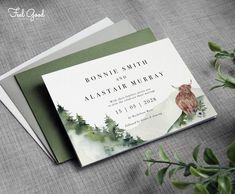 a wedding card with an image of a deer in the woods on it and greenery