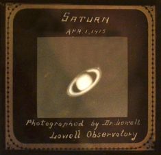 an image of saturn taken from above with the caption'captured by unknown lovell observatory '