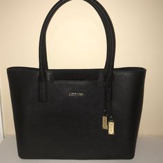 New Never Used. No Tags, Was A Present Black Calvin Klein Bag For Formal Occasions, Elegant Calvin Klein Shoulder Bag For Formal Occasions, Calvin Klein Black Formal Bag, Elegant Calvin Klein Bag For Formal Occasions, Classic Calvin Klein Office Bag, Elegant Calvin Klein Formal Bag, Elegant Formal Calvin Klein Bag, Calvin Klein Black Rectangular Bag, Black Rectangular Calvin Klein Bag