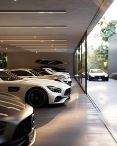 there are many cars parked in the garage