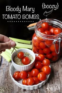 tomatoes and celery are in small bowls next to a jar of tomatos