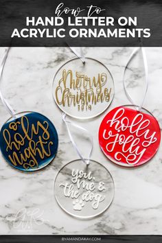 hand lettered christmas ornaments on marble background