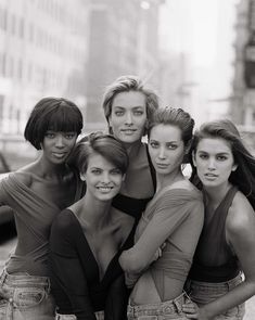 black and white photograph of six women posing together