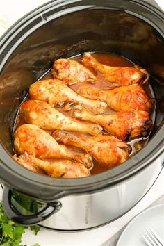 chicken wings are cooked in the crock pot and ready to be served for dinner