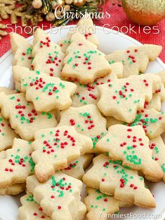 christmas shortbread cookies with sprinkles on a plate