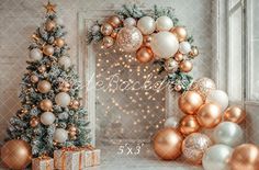 christmas decorations and presents in front of a door