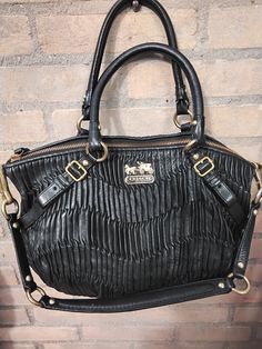 In great condition Coach Madison Sophia black Pleated soft leather top handle shoulder handbag! Style 15942. The is some small pen stains inside the bag. That is reflected in the price. Measurements: Height. 28cm/ 11 inch Width. 40cm/16 inch Coach Madison Bag Black, Tote Bad, Sophia Black, Purple Tote Bag, Coach Tote Bags, Women Y2k, Coach Tote, Leather Handbags Tote, Black Leather Bags