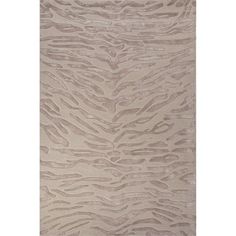 a beige rug with an animal print pattern