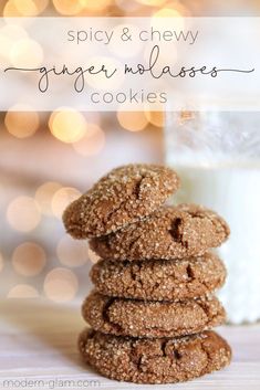 cookies stacked on top of each other next to a glass of milk