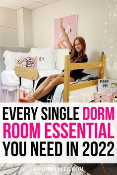 a woman sitting on top of a bed with the words every single dorm room essential you need