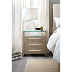 a bedroom scene with focus on the nightstand