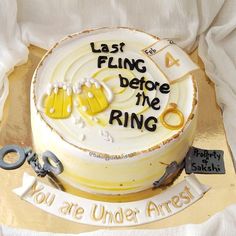 a cake that has been decorated with the words last fling before the ring