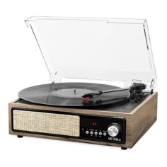 Enjoy the nostalgic sound of vinyl with this Victrola 3-in-1 Bluetooth Record Player with Built-in Speakers.Enjoy the nostalgic sound of vinyl with this Victrola 3-in-1 Bluetooth Record Player with Built-in Speakers.PRODUCT FEATURES3-speed turntable (33 1/3, 45, 78 RPM) plays all of your favorite vinyl recordsWirelessly stream music from your Bluetooth enabled deviceFM radioBuilt-in stereo speakers and RCA outputWHAT'S INCLUDEDRecord playerPower adaptor13.1"H x 5.4"W x 13.16"DWeight: 4.89 lbs.Co Disco Drawing, Victrola Record Player, Modern Record Player, Suitcase Record Player, Bluetooth Record Player, Electronic Recycling, Vinyl Music, Record Players, Built In Speakers