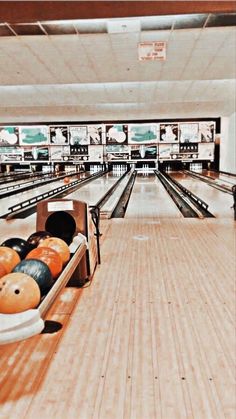 a bowling alley filled with lots of bowling balls