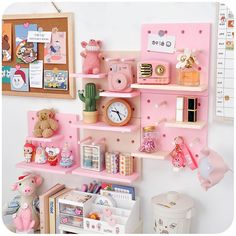 there is a pink shelf with many items on it and a teddy bear in the corner