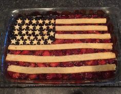 an american flag made out of fruit in a casserole dish